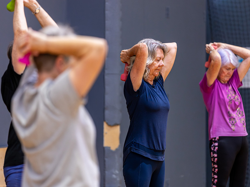 Photo of women doing group fitness